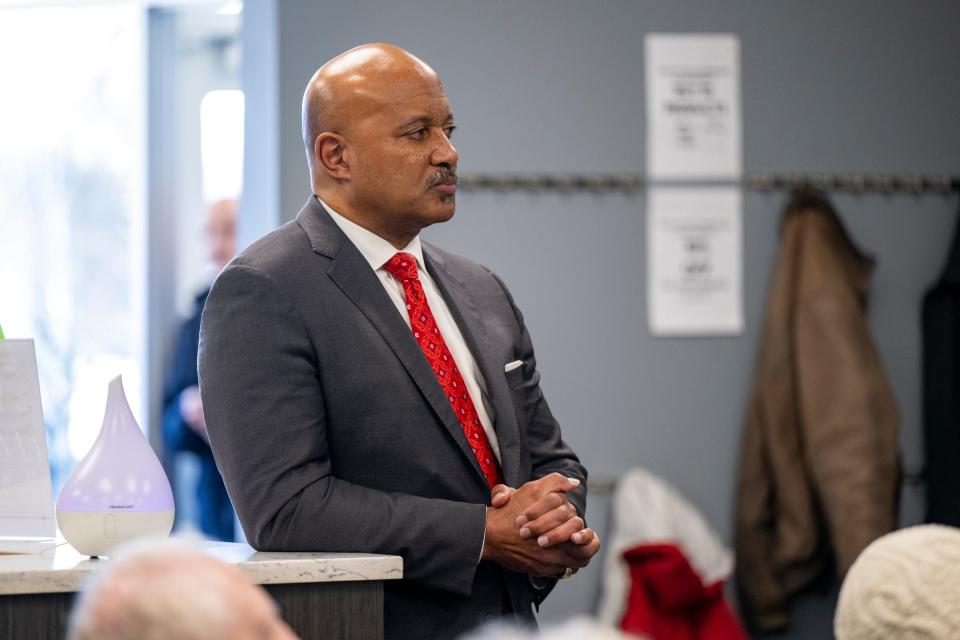 Former Indiana Attorney General Curtis Hill, Republican candidate for Indiana Governor, waits for his introduction before speaking to a small crowd of voters, Tuesday, March 19, 2024, at MaxLiving Indy, a chiropractic facility on the Northside of Indianapolis.