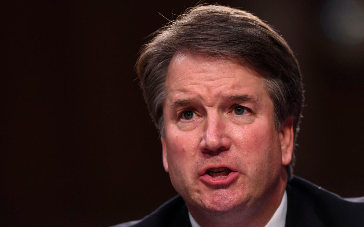 The claims against Brett Kavanaugh have reopened fierce debate over his appointment - AFP