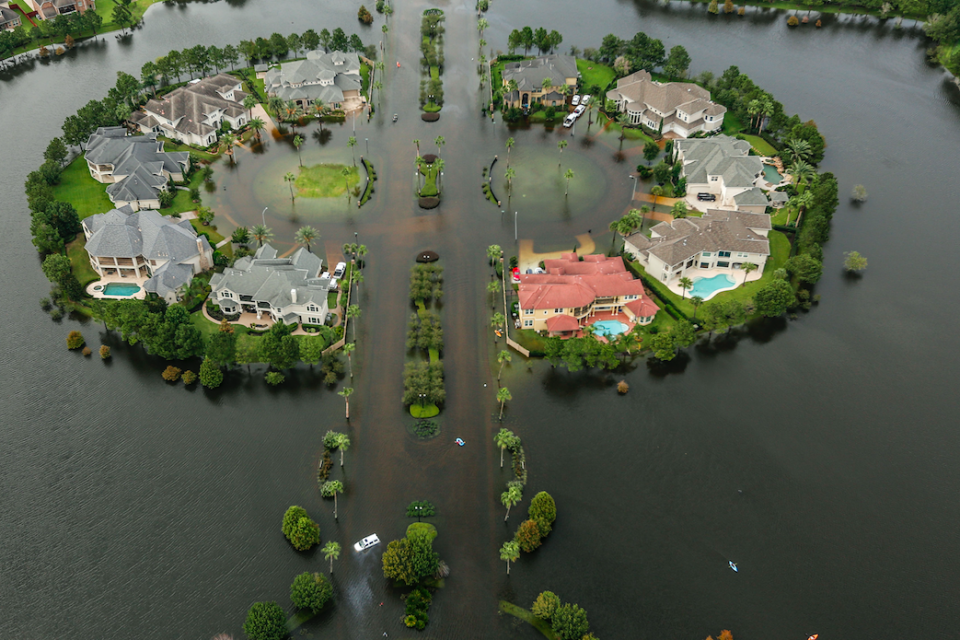 <em>Homes are surrounded by floodwater as the devastation from Hurricane Harvey continues (PA)</em>