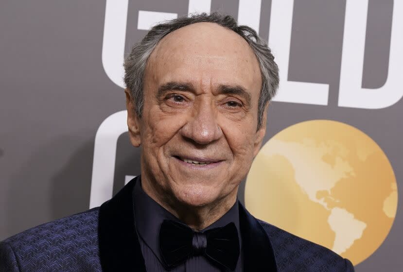 F. Murray Abraham a dark blue suit jacket with a black bow-tie