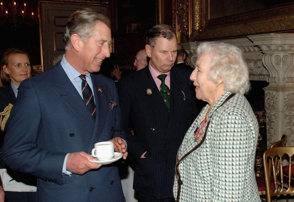 LONDON - DECEMBER 7: (NO PUBLICATION IN UK MEDIA FOR 28 DAYS)  Prince Charles, Prince of Wales chats with Dame Vera Lynn as he visits the 'Not Forgotten Association' at St. James's Palace  on December 7, 2006  in London, England.  The Association works for the benefit of wounded and disabled service and ex-service personnel. (Photo by Pool/Anwar Hussein Collection/Getty Images)