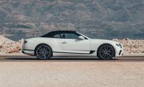 <p>The convertible roof is made from fabric-Bentley never got sucked into the nouveau riche retractable-hardtop fad-with a new ultra-snug sealing system that gives a three-decibel reduction in noise at cruising speeds.</p>