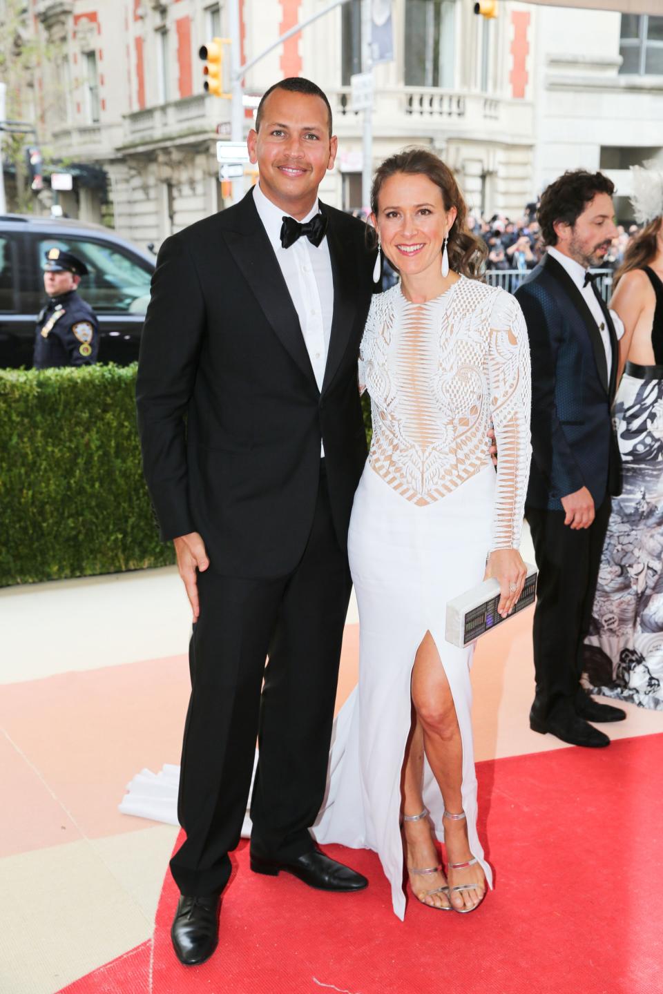 <h1 class="title">Alex Rodriguez and Anne Wojcicki in Tamara Mellon shoes and Edie Parker bag</h1><cite class="credit">Photo: BFA.com</cite>