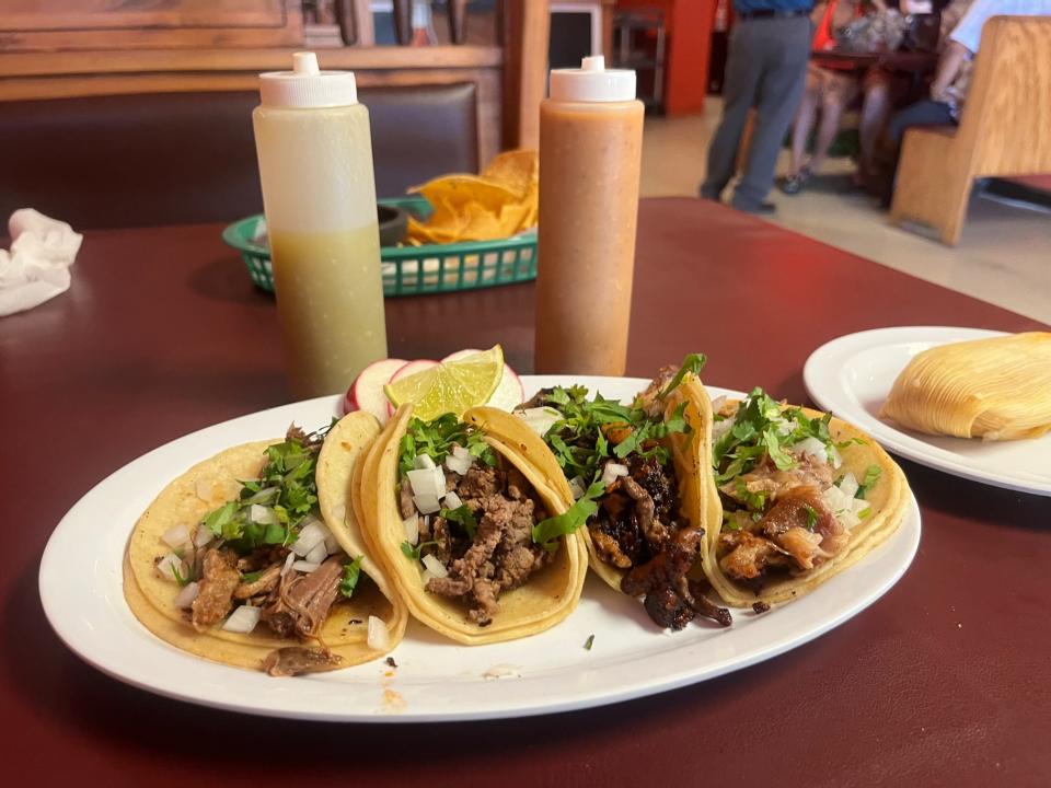 An assortment of tacos on housemade tortillas at Taqueria Los Compadres in Newark, Delaware.