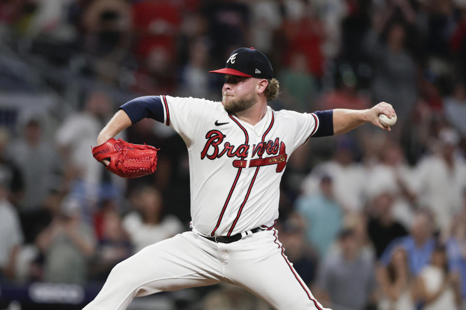 Atlanta Braves relief pitcher A.J. Minter throws to an Arizona Diamondbacks batter during the ninth inning of a baseball game Saturday, July 30, 2022, in Atlanta. (AP Photo/Butch Dill)