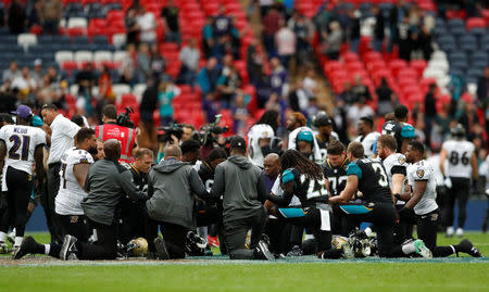 NFL Football - Jacksonville Jaguars vs Baltimore Ravens - NFL International Series - Wembley Stadium, London, Britain - September 24, 2017 Jacksonville Jaguars and Baltimore Ravens players after the game Action Images via Reuters/Andrew Boyers