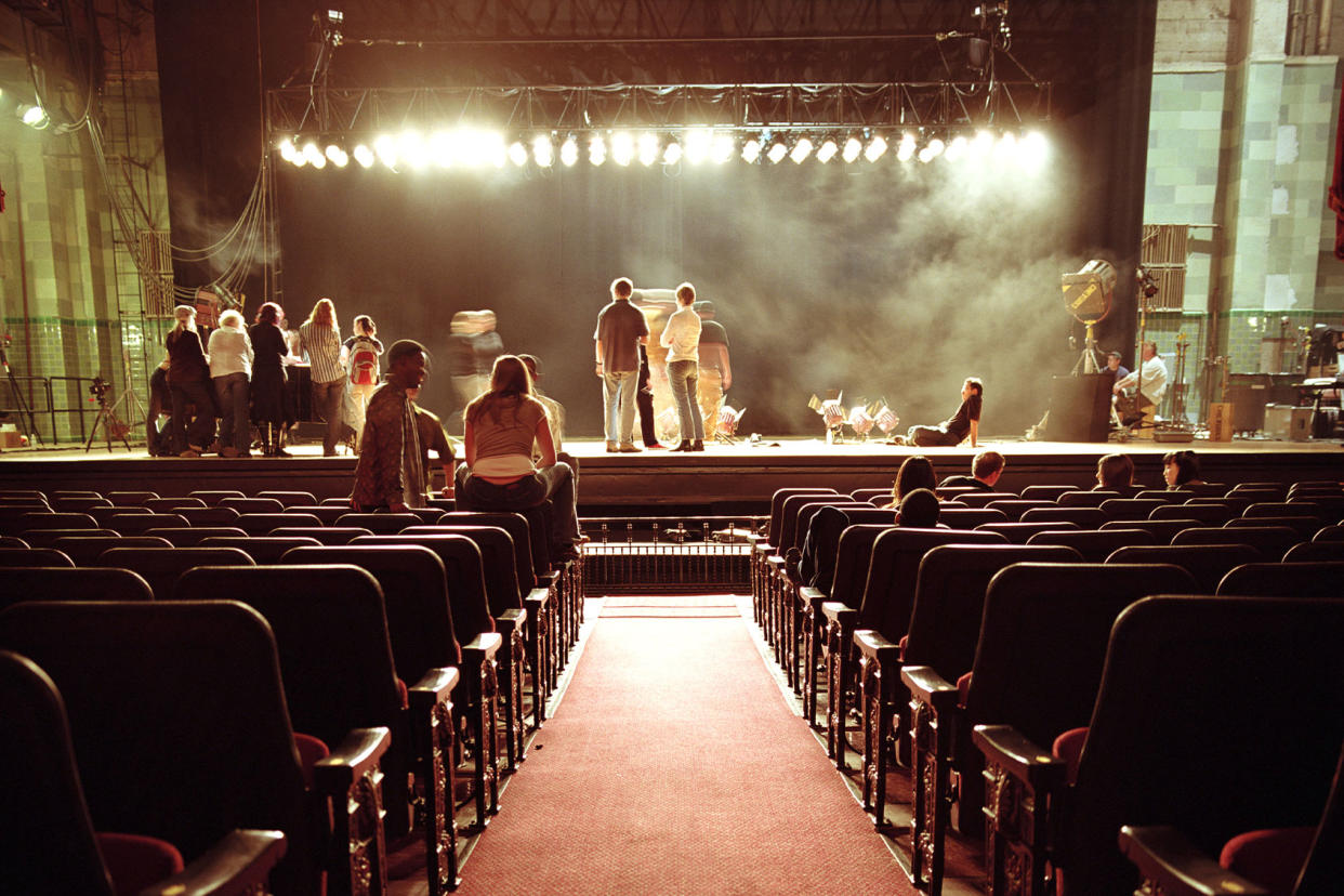 People on stage in empty theatre Getty images/Siri Stafford