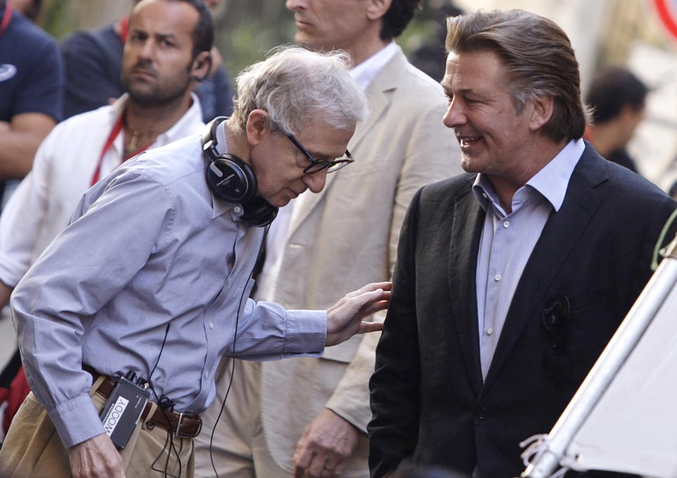 U.S. director Woody Allen (L) talks with Alec Baldwin during the shooting of 