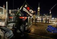 <p>A truck that is part of a trucker convoy to protest coronavirus disease (COVID-19) vaccine mandates for cross-border truck drivers is seen on Parliament Hill in Ottawa, Ontario, Canada, January 28, 2022. REUTERS/Patrick Doyle</p> 