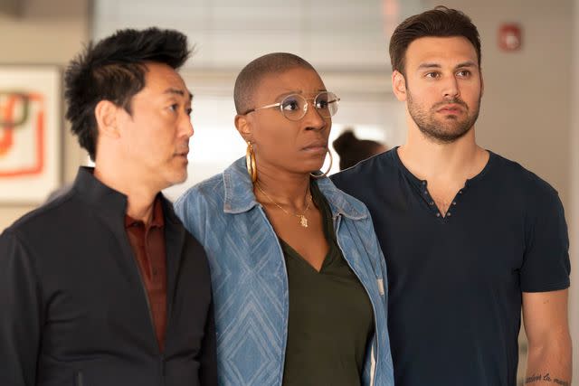 <p>Disney/Mike Taing</p> Kenneth Choi, Aisha Hinds, and Ryan Guzman on the '9-1-1' season 7 finale, "All Fall Down."