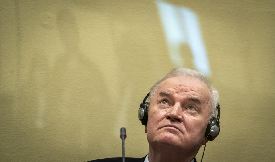 Former Bosnian Serb military chief Ratko Mladic sits in the court room in The Hague, Netherlands, Tuesday, June 8, 2021, where the United Nations court delivers its verdict in the appeal of Mladic against his convictions for genocide and other crimes and his life sentence for masterminding atrocities throughout the Bosnian war. (Jerry Lampen/Pool via AP)