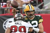 Green Bay Packers' Aaron Rodgers thorws during the second half of an NFL football game against the Tampa Bay Buccaneers Sunday, Sept. 25, 2022, in Tampa, Fla. (AP Photo/Jason Behnken)