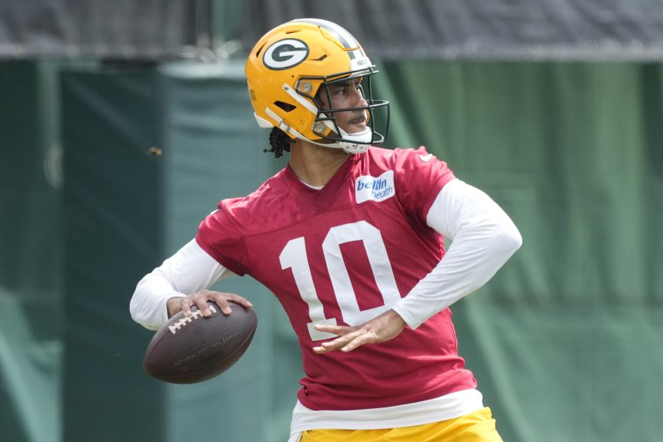 Green Bay Packers' Jordan Love throws during an NFL football practice session Tuesday, June 4, 2024, in Green Bay, Wis. (AP Photo/Morry Gash)