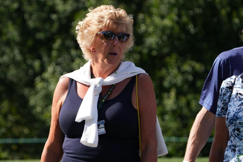 Denise Jakows, mother of Brooks Koepka, looks on during the first round of the Masters Tournament.