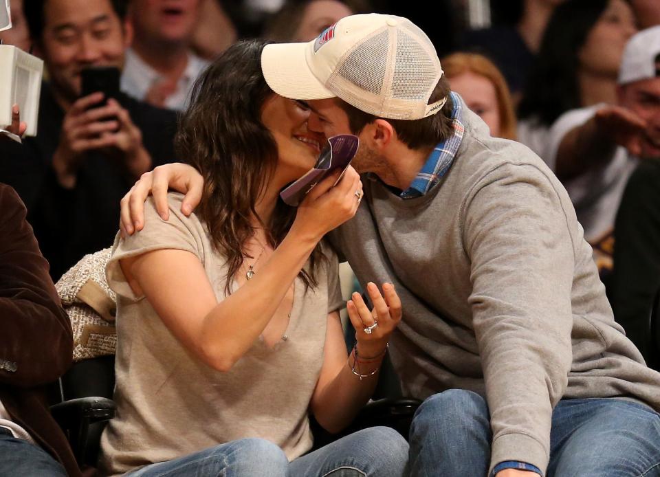 ashton mila kiss