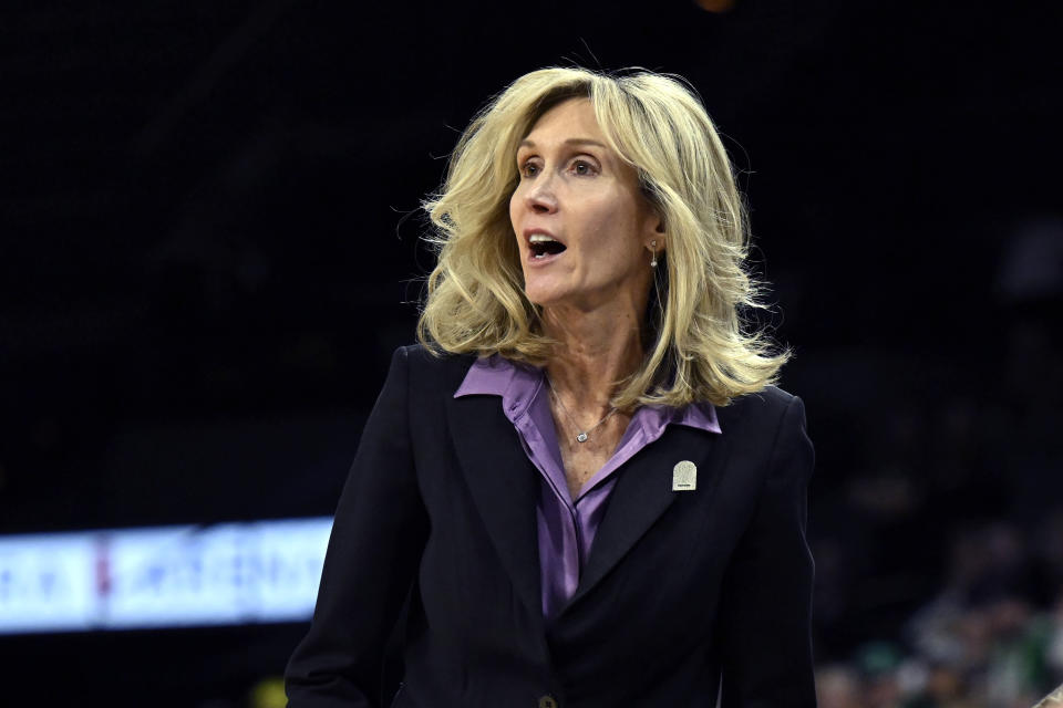 Washington head coach Tina Langley looks on during the second half of an NCAA college basketball game against Oregon in the first round of the Pac-12 women's tournament Wednesday, March 1, 2023, in Las Vegas. (AP Photo/David Becker)