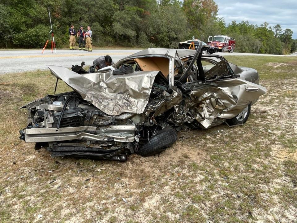 The driver of this older model Buick died Friday morning in a two-vehicle crash along County Road 314.