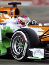 Force India Formula One driver Paul di Resta of Britain drives during the qualifying session of the Singapore F1 Grand Prix at the Marina Bay street circuit in Singapore September 21, 2013. REUTERS/Tim Chong (SINGAPORE - Tags: SPORT MOTORSPORT F1)