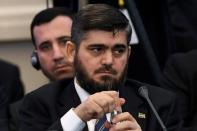 Chief rebel negotiator Mohammad Alloush attends the first session of Syria peace talks at Astana's Rixos President Hotel on January 23, 2017