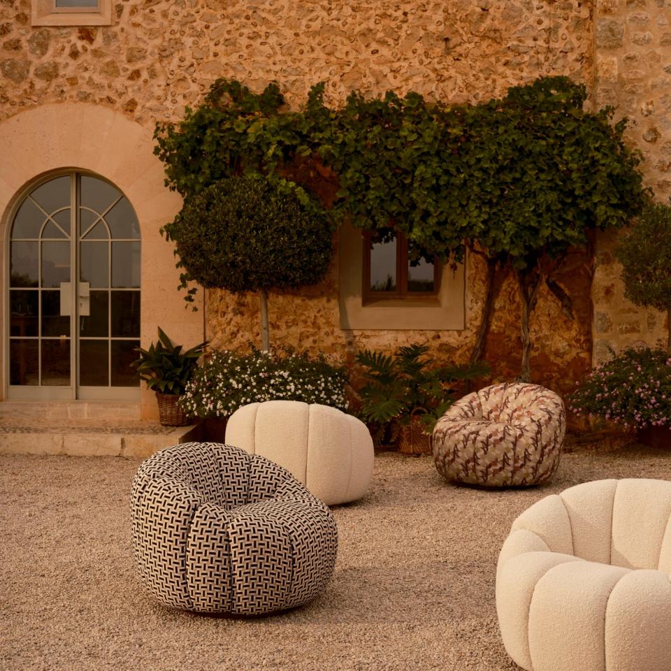 Soho Home's Garret armchair is a beautifully made item of furniture that is suitable for outdoor use