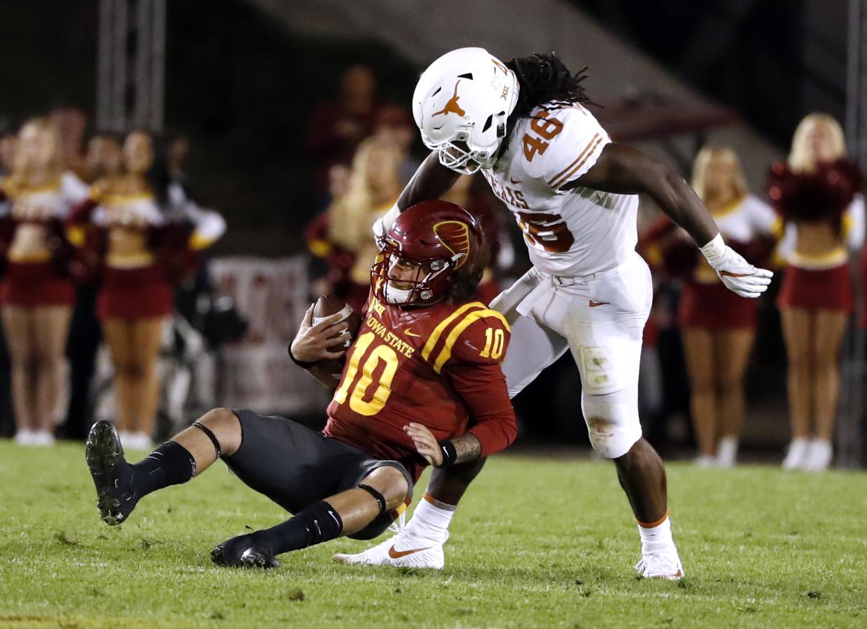 Malik Jefferson had 110 tackles and four sacks in 2017, including this sack of Jacob Park. (Photo by David Purdy/Getty Images)