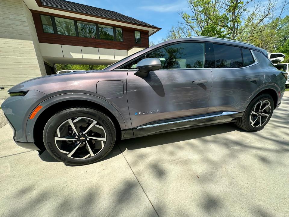 A Chevrolet Equinox EV parked in a driveway