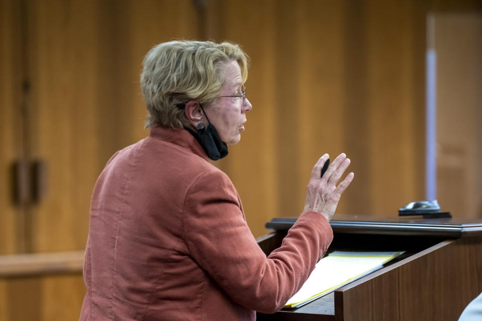 Deborah McKelvy, guardian ad litem for Ethan Crumbley, questions a witness during a placement hearing for Crumbley at Oakland County circuit court in Pontiac, Mich., on Tuesday, Feb. 22, 2022. Crumbley, 15, is charged with the fatal shooting of four fellow students and the wounding of seven others, including a teacher at Oxford High School on Nov. 30. (David Guralnick/Detroit News via AP, Pool)