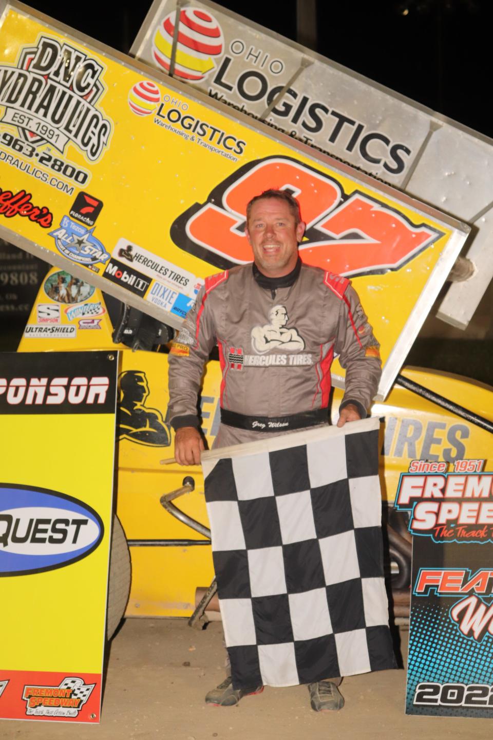 Greg Wilson celebrates after winning for the second time this season at Fremont Speedway.