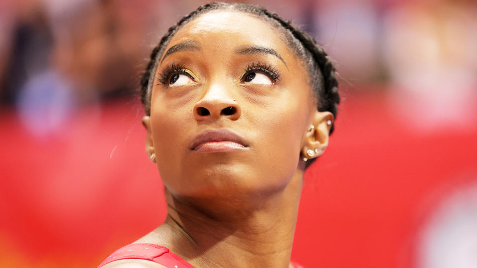 Simone Biles (pictured) looking up before the US Women's Gymnastics Olympic trials.