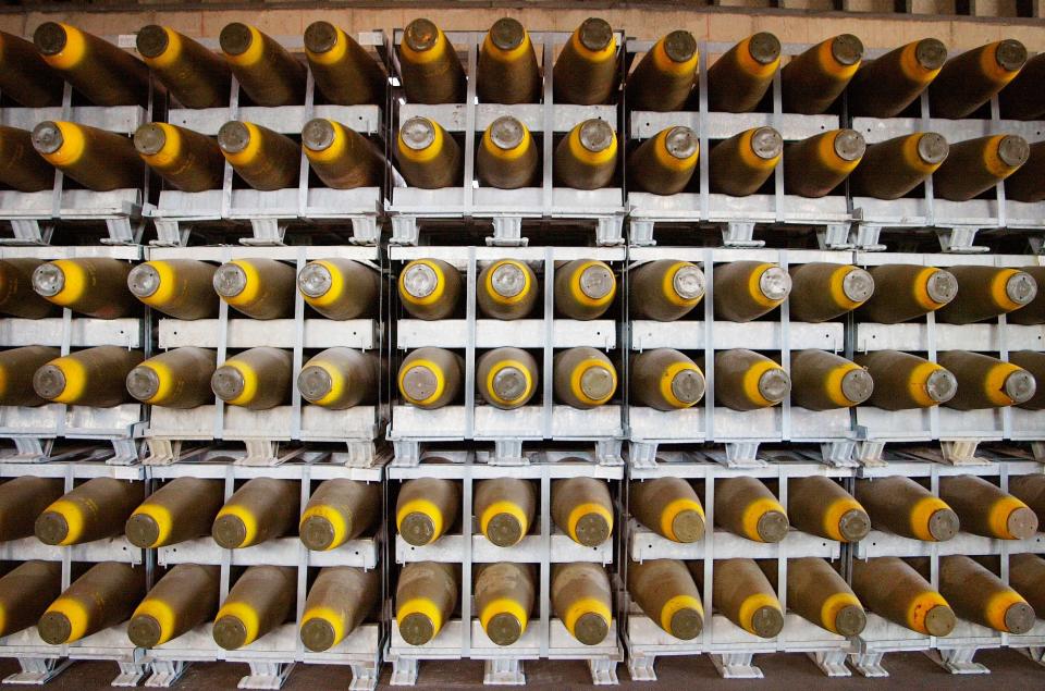 Five-hundred pound Air Force asset bombs stacked from floor to ceiling wait to be shipped at Crane NSA in January 2003.