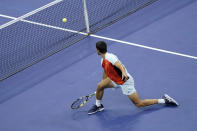 Carlos Alcaraz, of Spain, returns a shot to Casper Ruud, of Norway, during the men's singles final of the U.S. Open tennis championships, Sunday, Sept. 11, 2022, in New York. (AP Photo/Mary Altaffer)