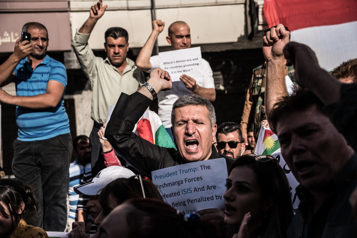 Kurds displaced from Kirkuk by the ongoing conflict between Iraq, allied with Iranian-backed militia group Hashd al Shaabi, and the semiautonomous Kurdistan region, protest outside the U.S. Embassy in Erbil. They are asking where the international community was and why it didn’t help them to keep Kirkuk. (Photo: Elizabeth Fitt/SOPA Images/LightRocket via Getty Images)