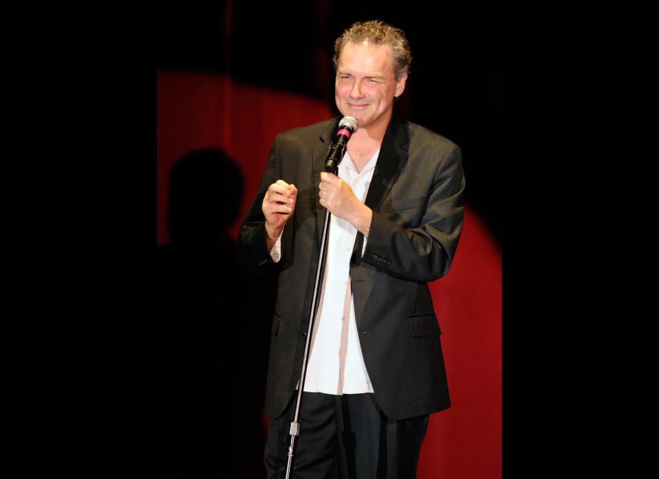 <a href="http://twitter.com/#!/normmacdonald" target="_hplink">@normmacdonald</a>