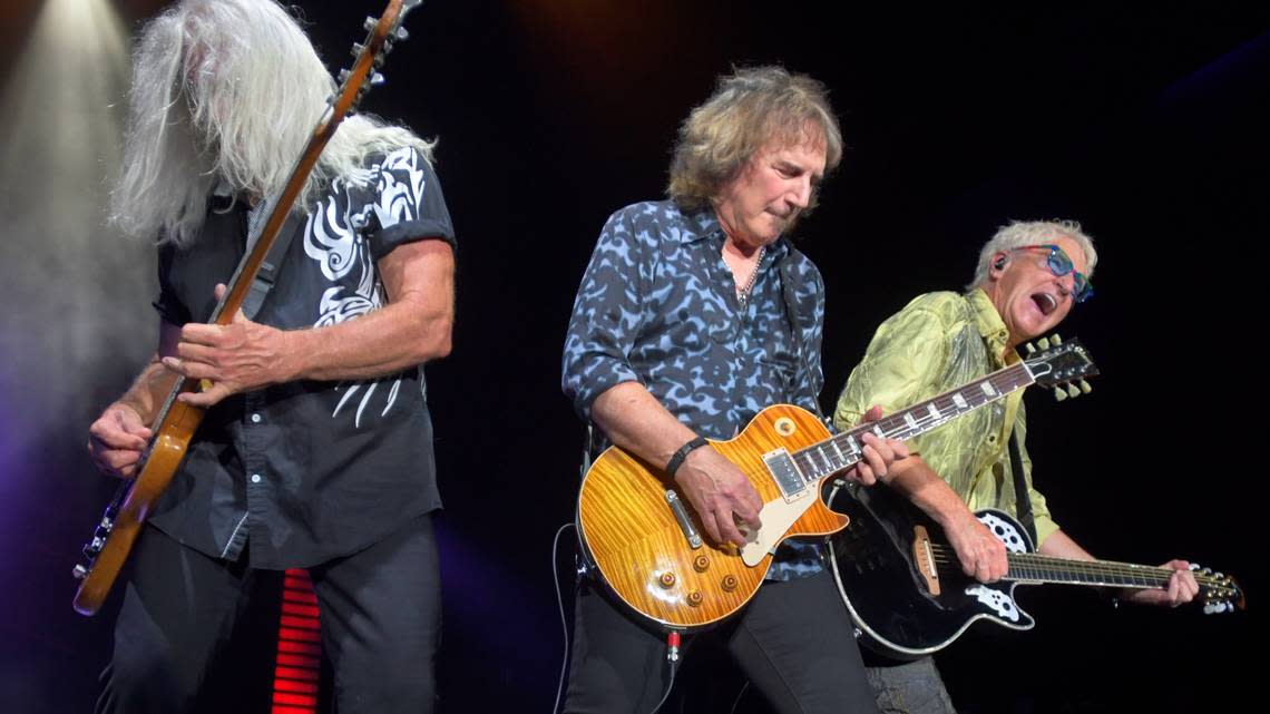 REO Speedwagon’s Bruce Hall (left), Dave Amato (center) and Kevin Cronin in concert at Raleigh, N.C.’s Coastal Credit Union Music Pavilion at Walnut Creek, Wednesday night, Aug. 10, 2022.