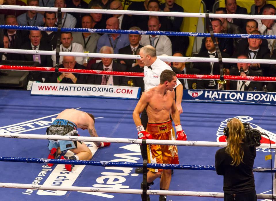 Ricky Hatton on his knees 10 rounds later  (photo: Neill Hamersley)