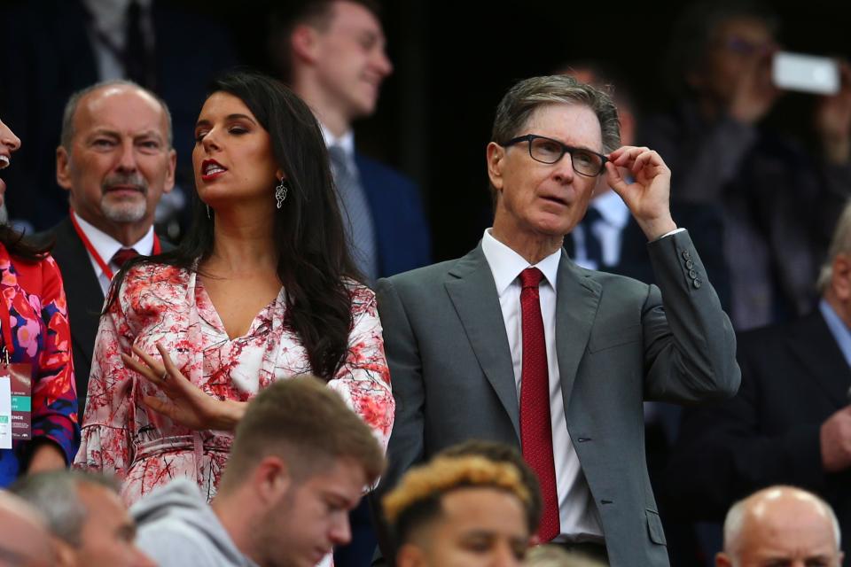 Liverpool owner John W Henry, right, watches his team during the English Premier League soccer match between Liverpool and Norwich City at Anfield in Liverpool, England, Friday, Aug. 9, 2019. (AP Photo/Dave Thompson)