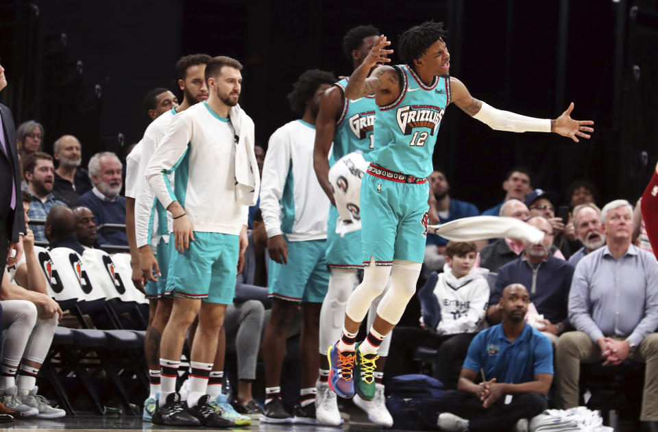 Memphis Grizzlies guard Ja Morant (12) reacts to a call during the second half of the team's NBA basketball game against the Cleveland Cavaliers on Friday, Jan. 17, 2020, in Memphis, Tenn. (AP Photo/Karen Pulfer Focht)