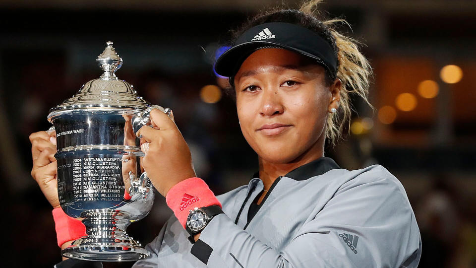 Photo by JOHN G MABANGLO/EPA-EFE/REX/Shutterstock Naomi Osaka of Japan holds up the championship trophy after defeating Serena Williams of the US in the women's final on the thirteenth day of the US Open Tennis Championships the USTA National Tennis Center in Flushing Meadows, New York, USA, 08 September 2018. The US Open runs from 27 August through 09 September.