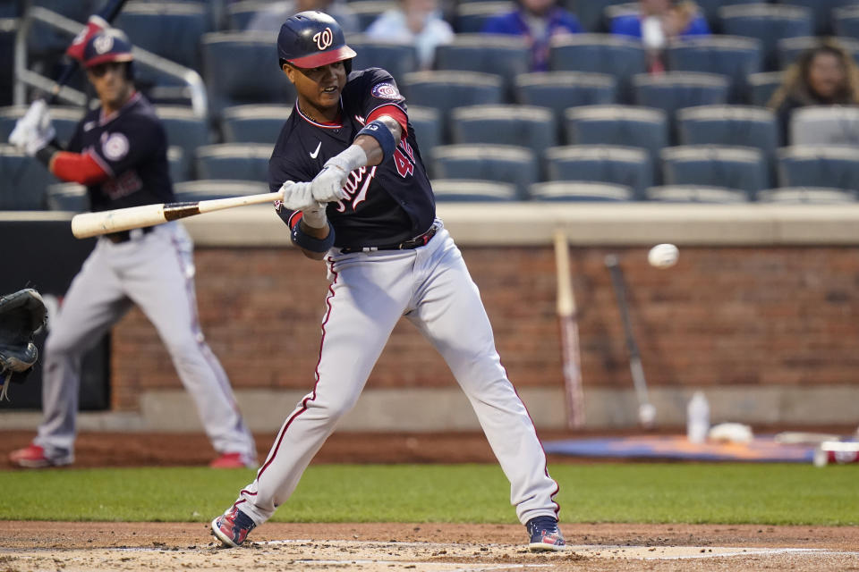 Washington Nationals' Starlin Castro hits a single during the second inning of the team's baseball game against the New York Mets on Friday, April 23, 2021, in New York. (AP Photo/Frank Franklin II)