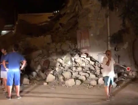 People view damage after an earthquake hit the island of Ischia, off the coast of Naples, Italy August 21, 2017. MANDATORY CREDIT Massimo Bottiglieri/Handout via Reuters