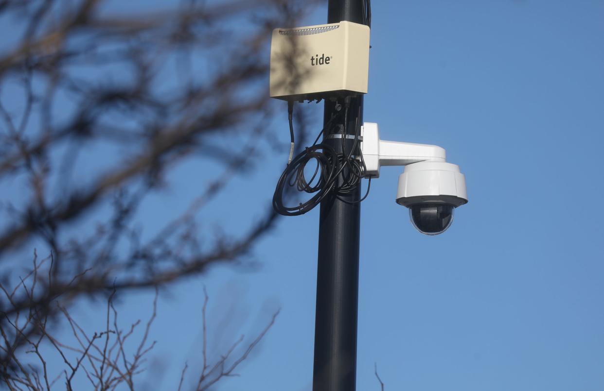 At least 150 blue light cameras are hung from posts throughout Rochester. This one on South Clinton Avenue faces businesses in the area. The Rochester Police Department uses live video feeds from the cameras to keep eyes on certain areas of the city.