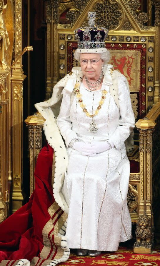 Dressed in full regalia, the Queen prepares to read the Queen's speech during the state opening of parliament in the Palace of Westminster on May 9, 2012.
