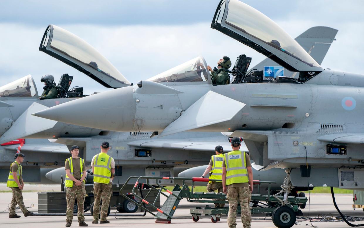 RAF Typhoon jets are prepared for take off