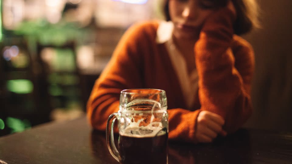 Women's bodies metabolize alcohol differently than men's do, leading to an increased risk of liver, heart and brain complications, experts say. - Dmytro Betsenko/Moment RF/Getty Images