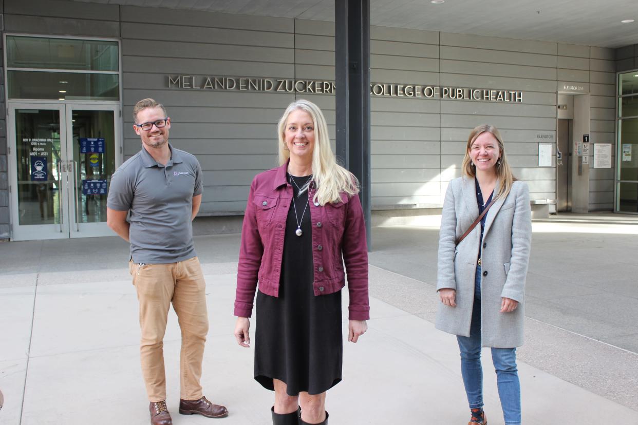 Reynolds and members of her team at UA's Western Region Public Health Training Center. From left to right: Online Designer Erich Healy, Director Kelly Reynolds, PhD, and Associate Director Abby Stoica, MPH.