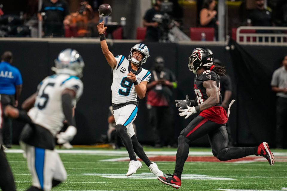 Sep 10, 2023; Atlanta, Georgia, USA; Carolina Panthers quarterback Bryce Young (9) throws the ball away while under pressure from the Atlanta Falcons during the second half at Mercedes-Benz Stadium. Mandatory Credit: Dale Zanine-USA TODAY Sports