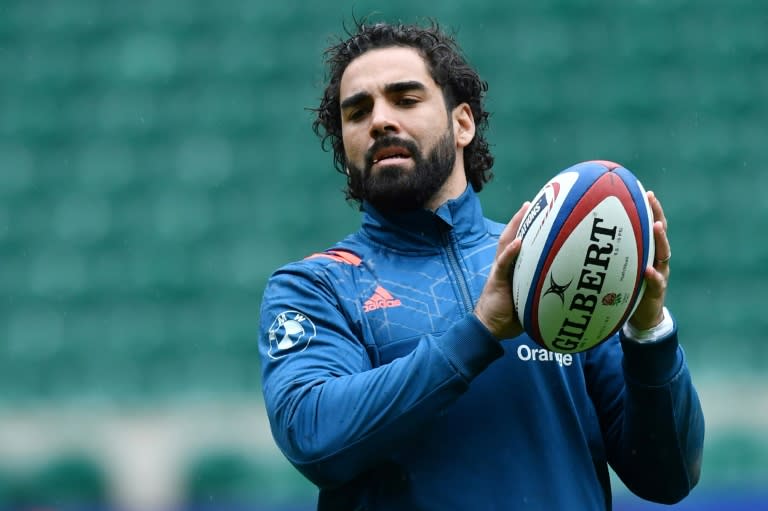 France winger Yoann Huget has been recalled to the starting line-up for the Six Nations clash against Ireland