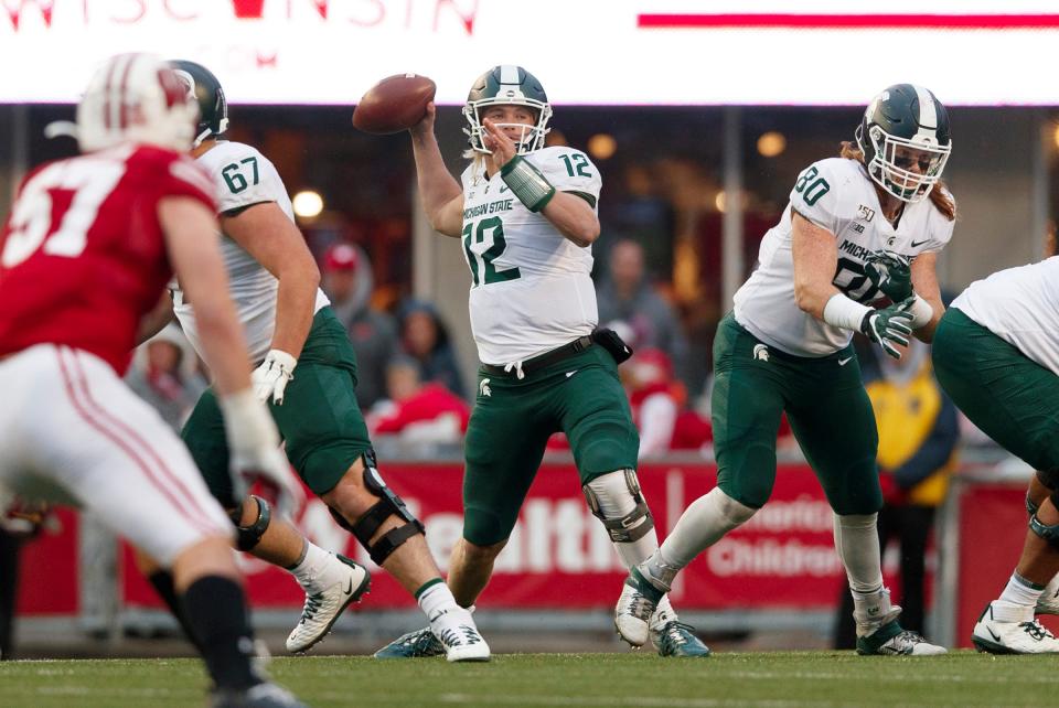 Michigan State quarterback Rocky Lombardi passes during the fourth quarter against Wisconsin, Saturday, Oct. 12, 2019, in Madison, Wis.