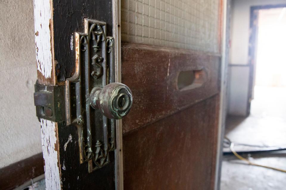 A doorknob with an “s” detail can be seen on the door of an abandoned office within the Sterick Building during a tour of the building in Downtown Memphis, on Thursday, October 19, 2023.