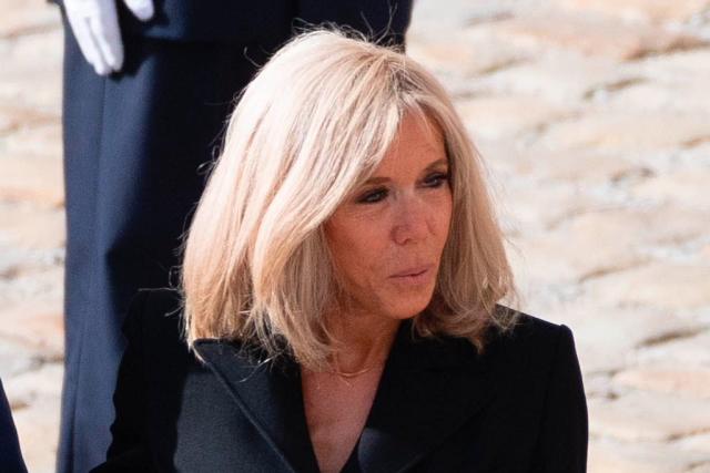 Brigitte Macron Elevates Classic Navy Suiting in Louis Vuitton Boots –  Footwear News